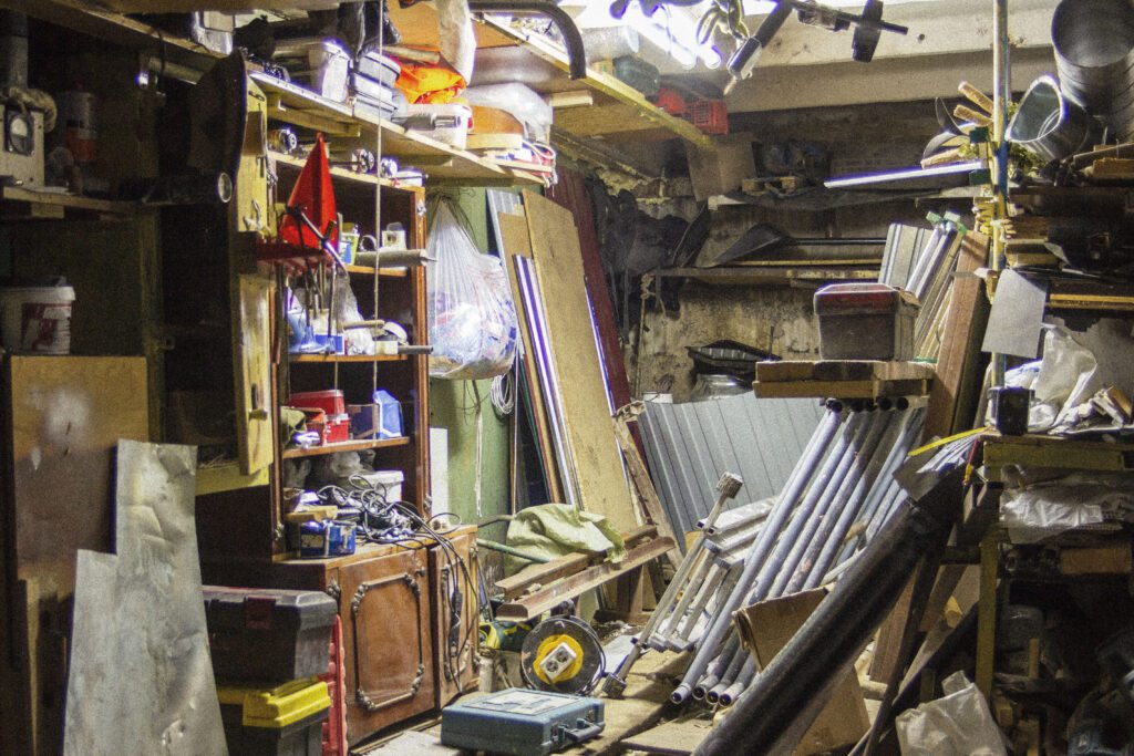 Hoarding: Big mess in an over stuffed suburban garage.